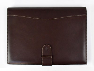Lot 365 - PATEK PHILIPPE; a brown leather branded...