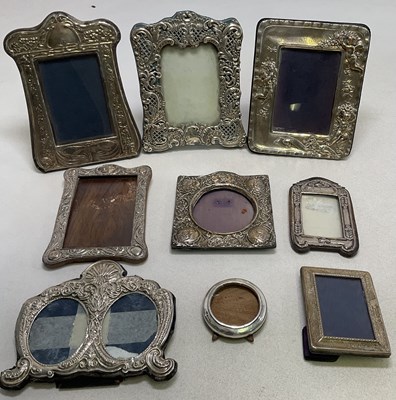 Lot 1047 - A group of nine silver fronted photograph...