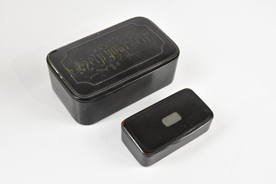 Lot 1464 - A large Victorian table papier-mâché snuff box...