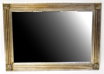 Lot 116 - A rectangular wall mirror, with bevelled...