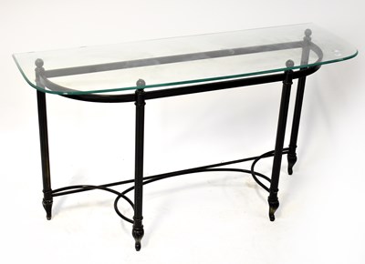 Lot 10 - A glass-topped metal demi-lune console table,...