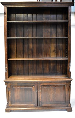Lot 102 - An 18th century style oak open breakfront...