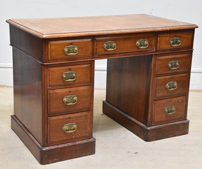 Lot 2162 - A Victorian walnut pedestal desk, with an...