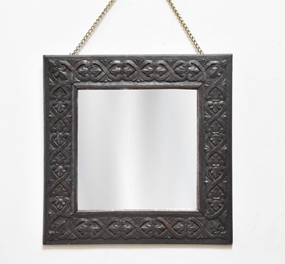 Lot 2030 - A carved oak framed mirror, probably...