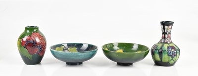 Lot 785 - MOORCROFT; two footed pin dishes in the...