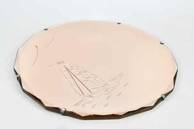 Lot 2033 - An Art Deco peach glass circular wall mirror,...