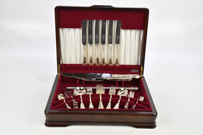 Lot 1013 - A mahogany cased canteen of silver plated...