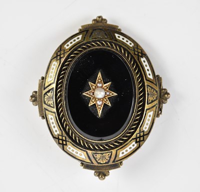 Lot 276 - A Victorian gilt metal mourning brooch, set...