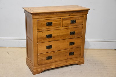 Lot 1104 - A modern oak chest of two short and three long...