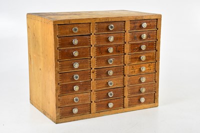 Lot 1395 - A miniature chest of twenty-four drawers,...