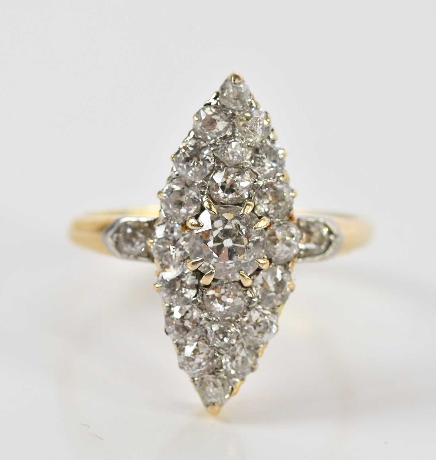 Lot 44 - An 18ct yellow gold diamond boat shaped ring,...