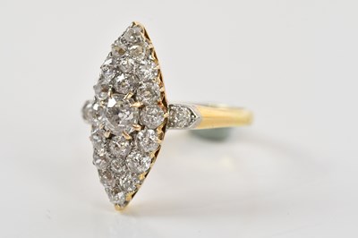 Lot 44 - An 18ct yellow gold diamond boat shaped ring,...