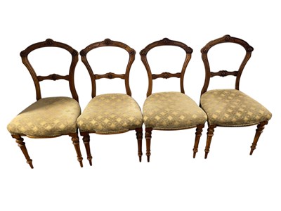 Lot 2189 - A set of four Victorian carved walnut dining...