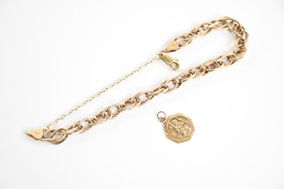Lot 247 - A 9ct yellow gold bracelet with St Christopher...