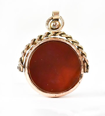 Lot 1148 - A 9ct yellow gold swivel fob set with...