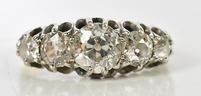 Lot 53 - A yellow metal graduated diamond set five...