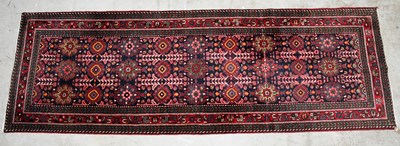 Lot 2664 - A Caucasian handwoven wool runner, worked with...