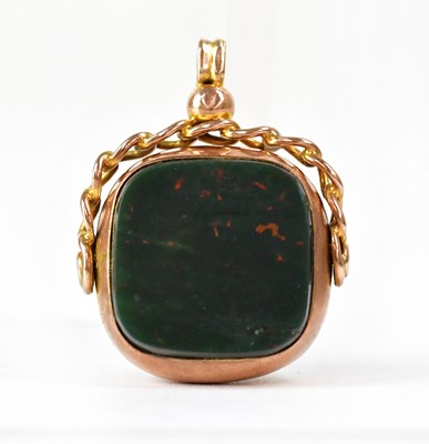 Lot 1147 - A 9ct yellow and rose gold swivel fob set with...