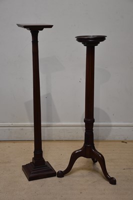 Lot 1180 - Two mahogany jardinière stands with reeded...