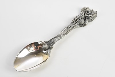 Lot 1141 - G RASPINI; an 800 grade silver serving spoon,...