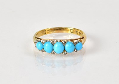 Lot 764 - An 18ct yellow gold ring set with five...
