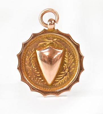 Lot 1102 - A 9ct yellow gold medal set with blank relief...