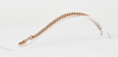 Lot 1145 - A 9ct rose gold short watch chain, each link...