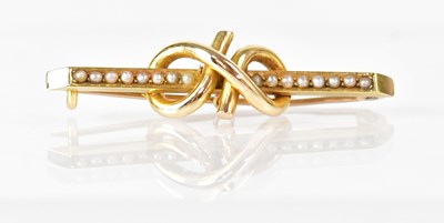 Lot 1064 - A 15ct yellow gold bar brooch set with seed...