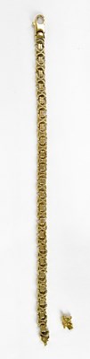 Lot 1059 - A 9ct yellow gold bracelet, length approx....