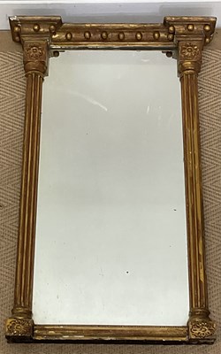 Lot 573 - A Regency gilt wood pier glass, with stepped...