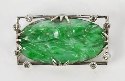Lot 265 - A white metal diamond and jade set rectangular...