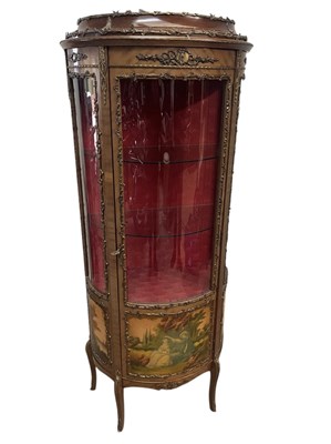 Lot 2133 - A French reproduction bowfront vitrine, with...