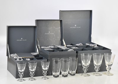 Lot 1688 - STEUBEN; three boxed sets of eight glasses of...