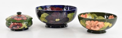 Lot 1715 - MOORCROFT; a large footed circular bowl in the...