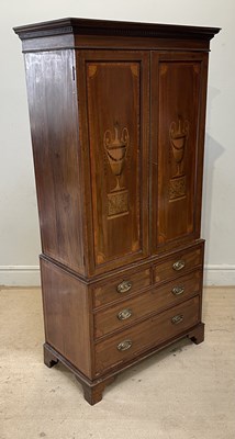 Lot 1118 - An Edwardian inlaid mahogany cabinet on chest...