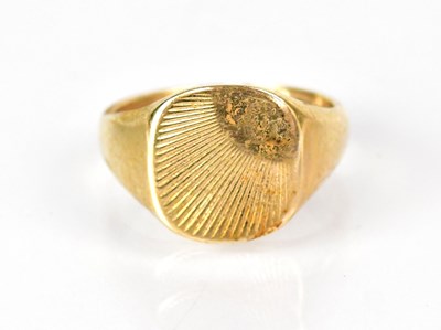 Lot 1052 - A 9ct yellow gold signet ring with sunburst...