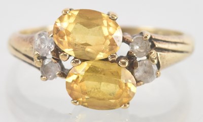 Lot 1167 - A 9ct yellow gold citrine and white stone set...