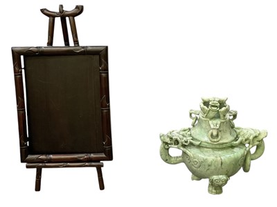 Lot 638 - An early 20th century Chinese carved green...