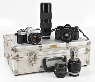 Lot 1583 - CANON; two 35mm film cameras, to include a...