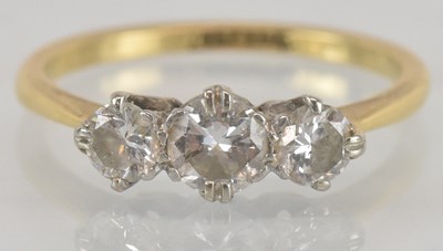 Lot 1152 - An 18ct gold diamond ring, the head set with...