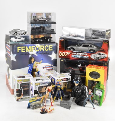 Lot 835 - A collection of model figures and vehicles, to...