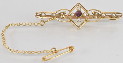 Lot 1281 - A 15ct yellow gold ruby and seed pearl set bar...