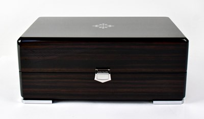 Lot 1151 - PATEK PHILLIPE; an empty lacquered fitted...