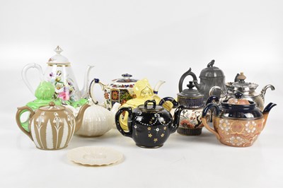 Lot 695 - A collection of Victorian and later teapots...
