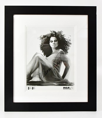 Lot 425 - DIANA ROSS; a black and white photograph...