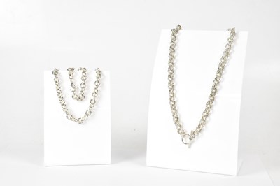 Lot 1085 - A 925 silver triple link chain necklace with T-...