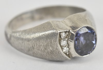 Lot 1106 - A platinum sapphire and diamond set ring, the...