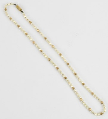 Lot 1224 - A 9ct yellow gold and seed pearl single strand...