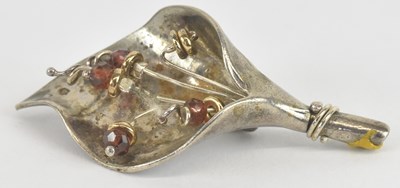 Lot 1288 - A Scandinavian white metal and red stone set...