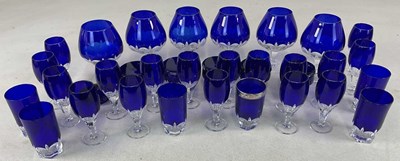 Lot 284 - A group of clear and blue tinted glasses...